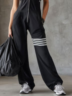 Danielle - Retro Sport-Jumpsuit mit Kapuze und Streifen