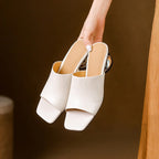 Virelle Curve Leder Mules mit Absatz