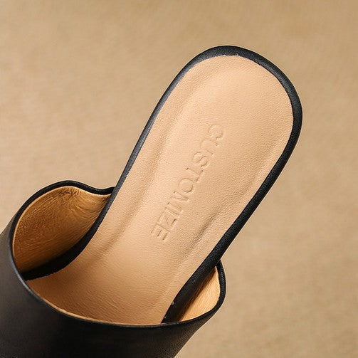 Virelle Curve Leder Mules mit Absatz
